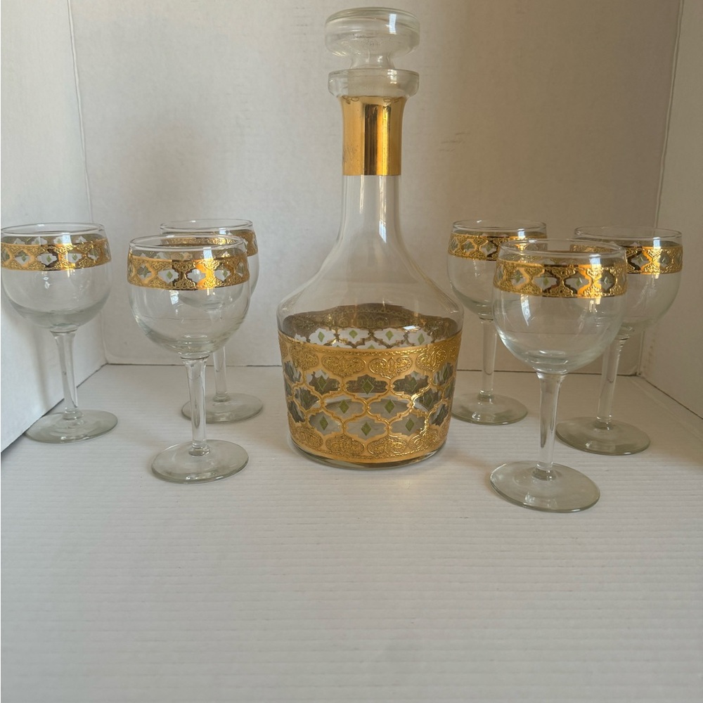 Elegant Gold and Silver Decanter Set
